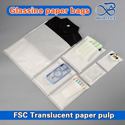 Sacs en papier glassine translucide 100% biodégradables avec impression personnalisable et fermeture auto-adhésive pour emballage de vêtements